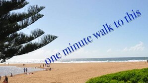 A beach with a clear sky and text overlay. - North Avoca Beach House
200m level walk to beach
4 bedrooms
secure yard (North Avoca)