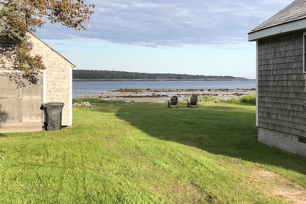 View of the back yard to the shore.