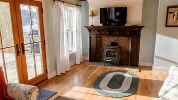 Smart TV, fireplace, books