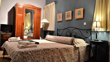 3 habitaciones, tabla de planchar con plancha, wifi y ropa de cama