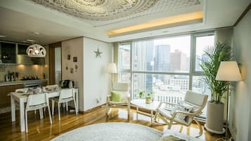Luxury Apartment - Foreigner Only (Superior Cozy Home) | Living area | 50-inch flat-screen TV with cable channels, TV