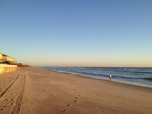 On the beach, sun loungers, beach towels