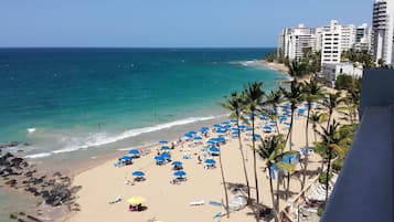 On the beach, sun loungers, beach towels