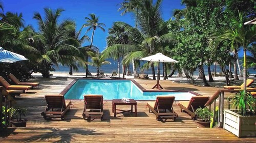 Family Friendly Beach Bungalow | Private Eco Dive Resort With A Pool & Beach