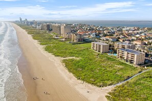 On the beach, sun-loungers, beach towels