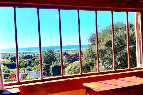 Upstairs room views of the beach.