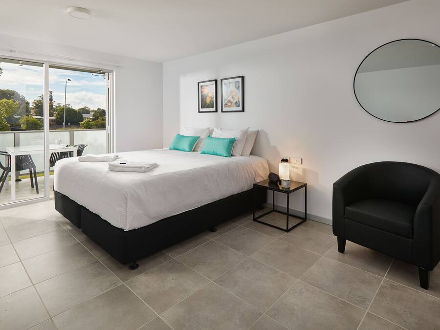 Laptop workspace, blackout curtains, soundproofing, iron/ironing board