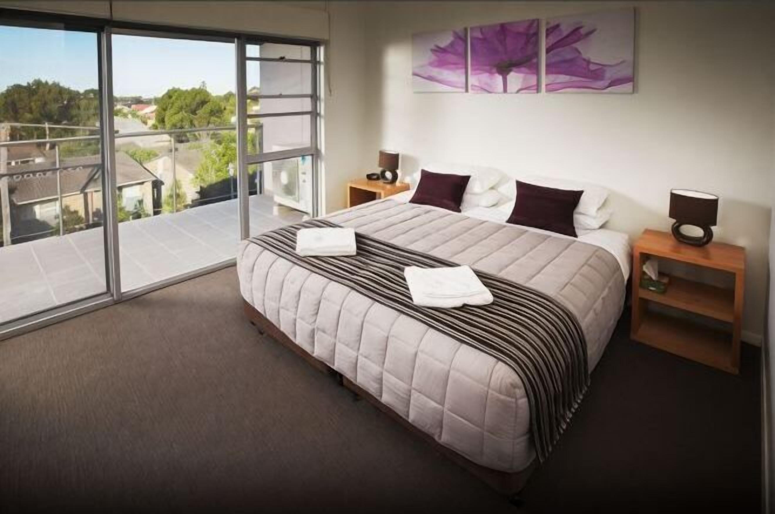 Laptop workspace, blackout curtains, soundproofing, iron/ironing board