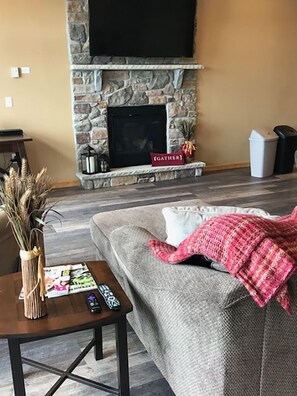 Smart TV, fireplace, table tennis, books