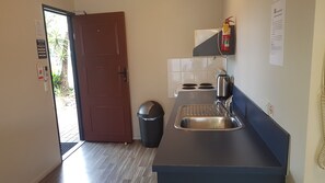 Departamento familiar, 2 habitaciones | Escritorio, tabla de planchar con plancha, cunas y wifi gratis 