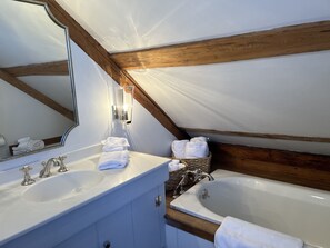 Combined shower/tub, hair dryer, towels, soap