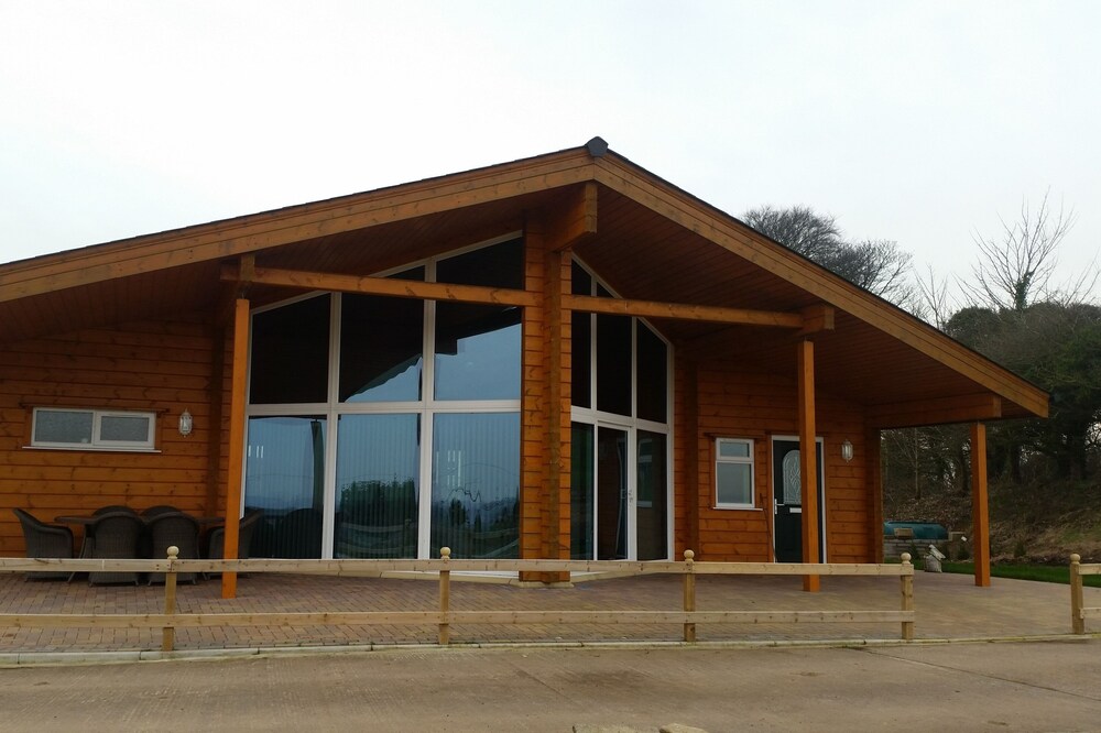 Luxury log cabin in beautiful surroundings with stunning views near Cardiff.