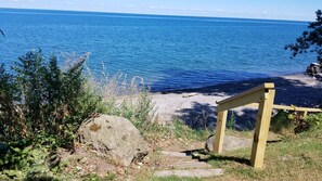 On the beach, sun-loungers