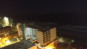 A multi-story hotel with a prominent 'Ocean Dunes' sign, featuring a modern architectural design with balconies and a rooftop area. - Panoramic Views from spacious 3 BR 2 BA condo (Myrtle Beach)