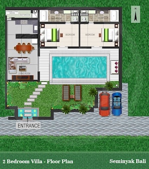 Relax in this 2-bedroom villa with a living room, fireplace, dining area, and pool in Seminyak, Bali.