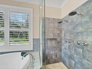 Bathtub, hair dryer, towels