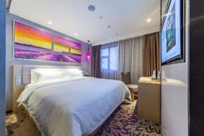 デラックス ダブルルーム | ミニバー、デスク、遮光カーテン、アイロン / アイロン台