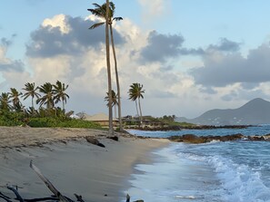 On the beach, sun-loungers, beach towels