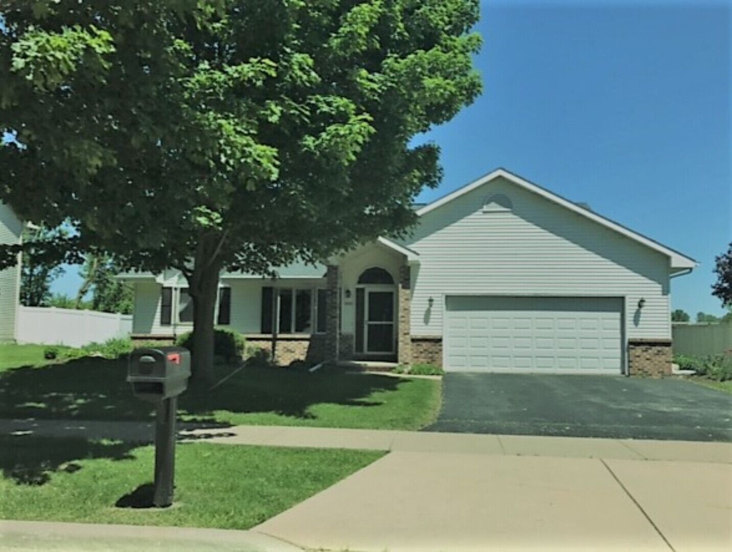Beautiful landscaped yard on a quiet street.
