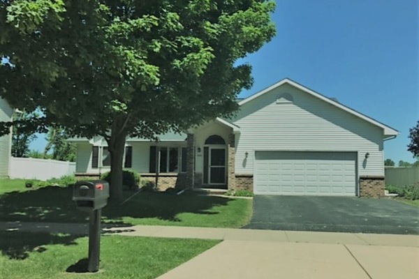 Beautiful landscaped yard on a quiet street.