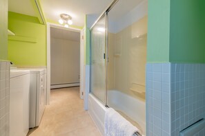 Combined shower/tub, hair dryer, towels, soap