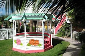 Situated in a beautifully landscaped area, this charming structure offers a peaceful retreat.