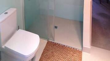 Bathtub, hair dryer, towels, soap