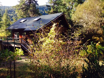 Beautiful 2 story house on Smith River- Private Beach, Trails,& More!