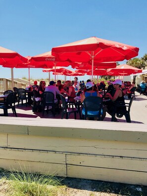 Outdoor dining - 90 Second Walk to Beach, 2 Hours Free Pickleball/Tennis Daily, Secure WIFI (Hilton Head Island)