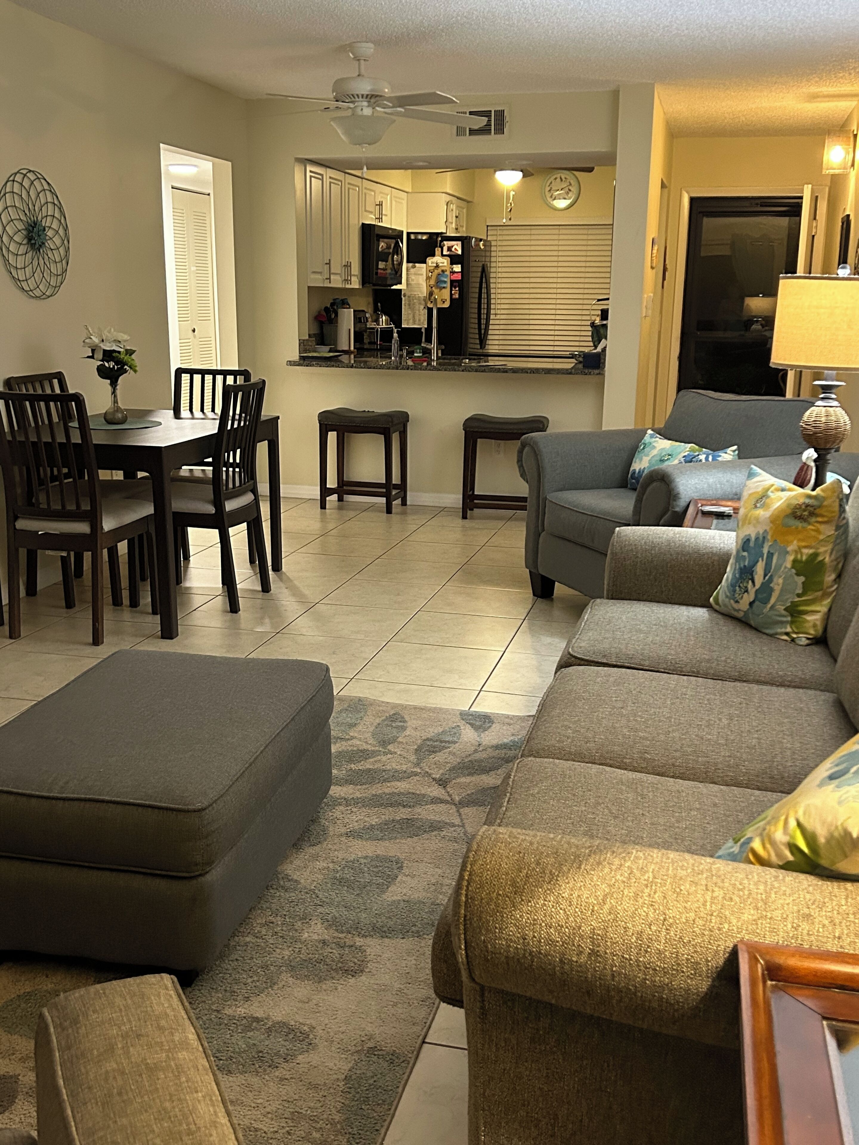 Spacious living room has expandable dining table to seat 8