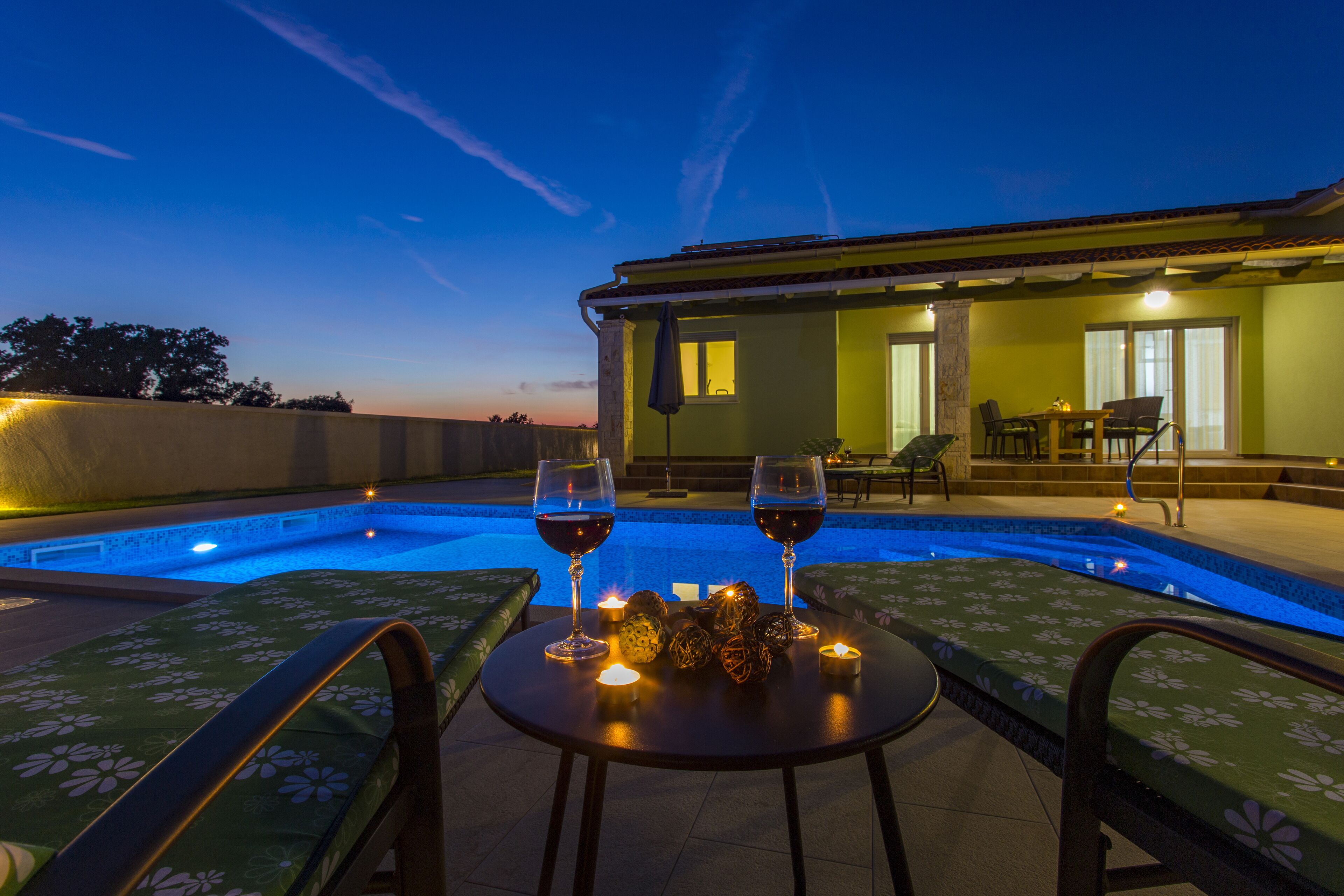 Outdoor pool, a heated pool, sun loungers