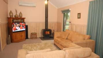 LCD TV, fireplace, DVD player, stereo