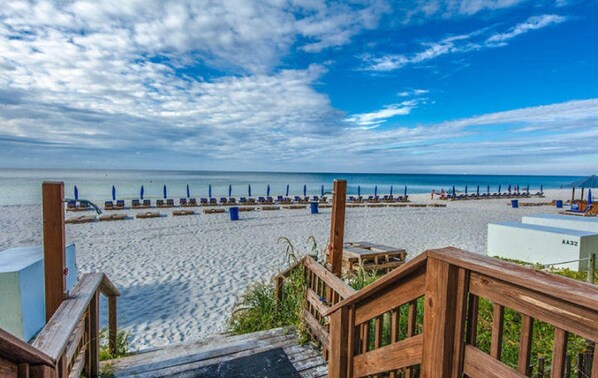 On the beach, sun-loungers