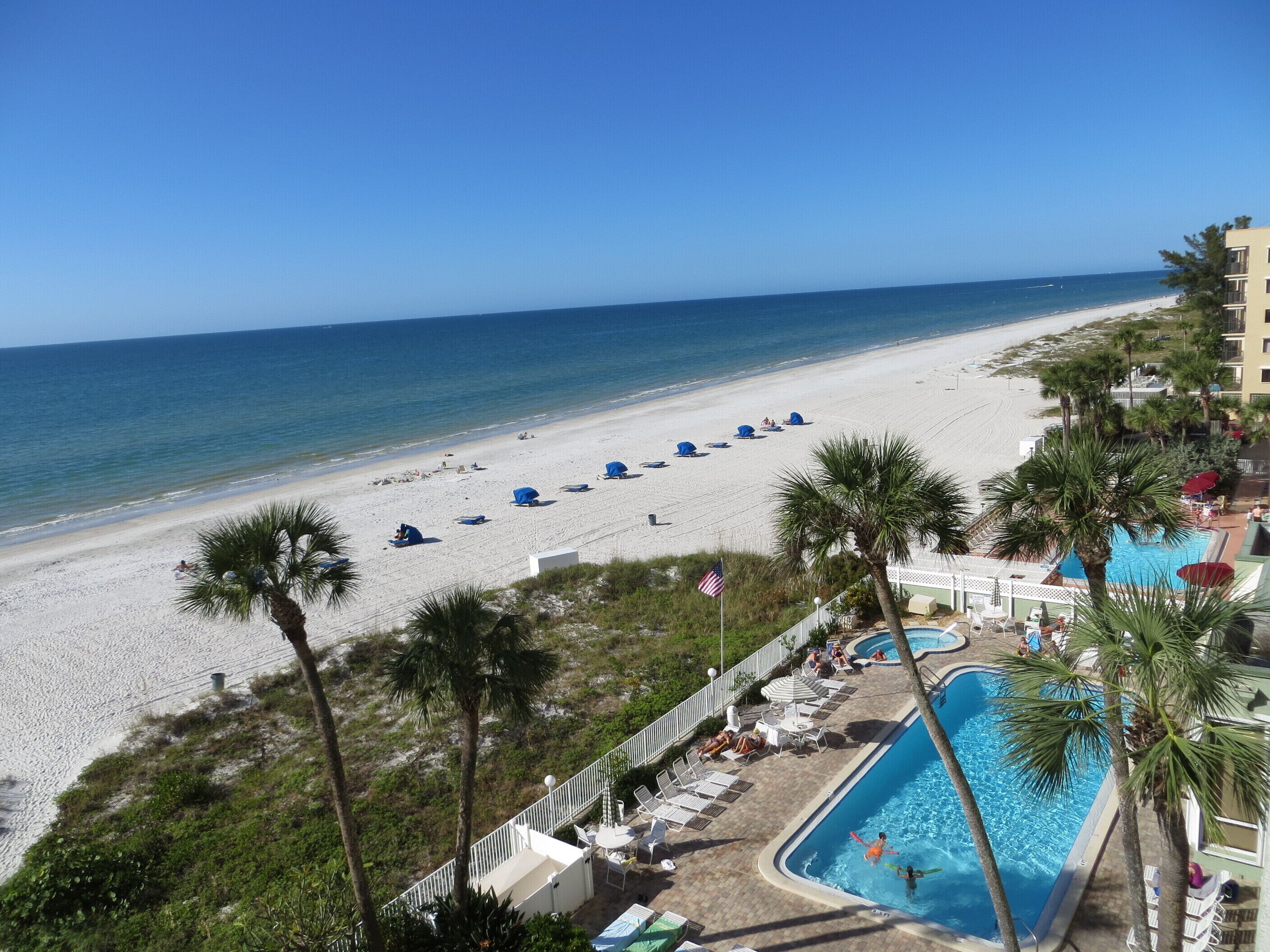On the beach, sun-loungers, beach towels