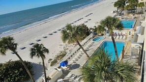 On the beach, sun loungers, beach towels