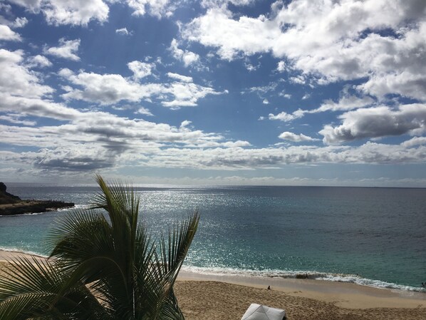 On the beach, sun-loungers, beach towels