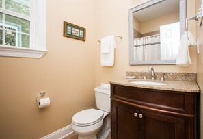Combined shower/bathtub, hair dryer, towels, soap