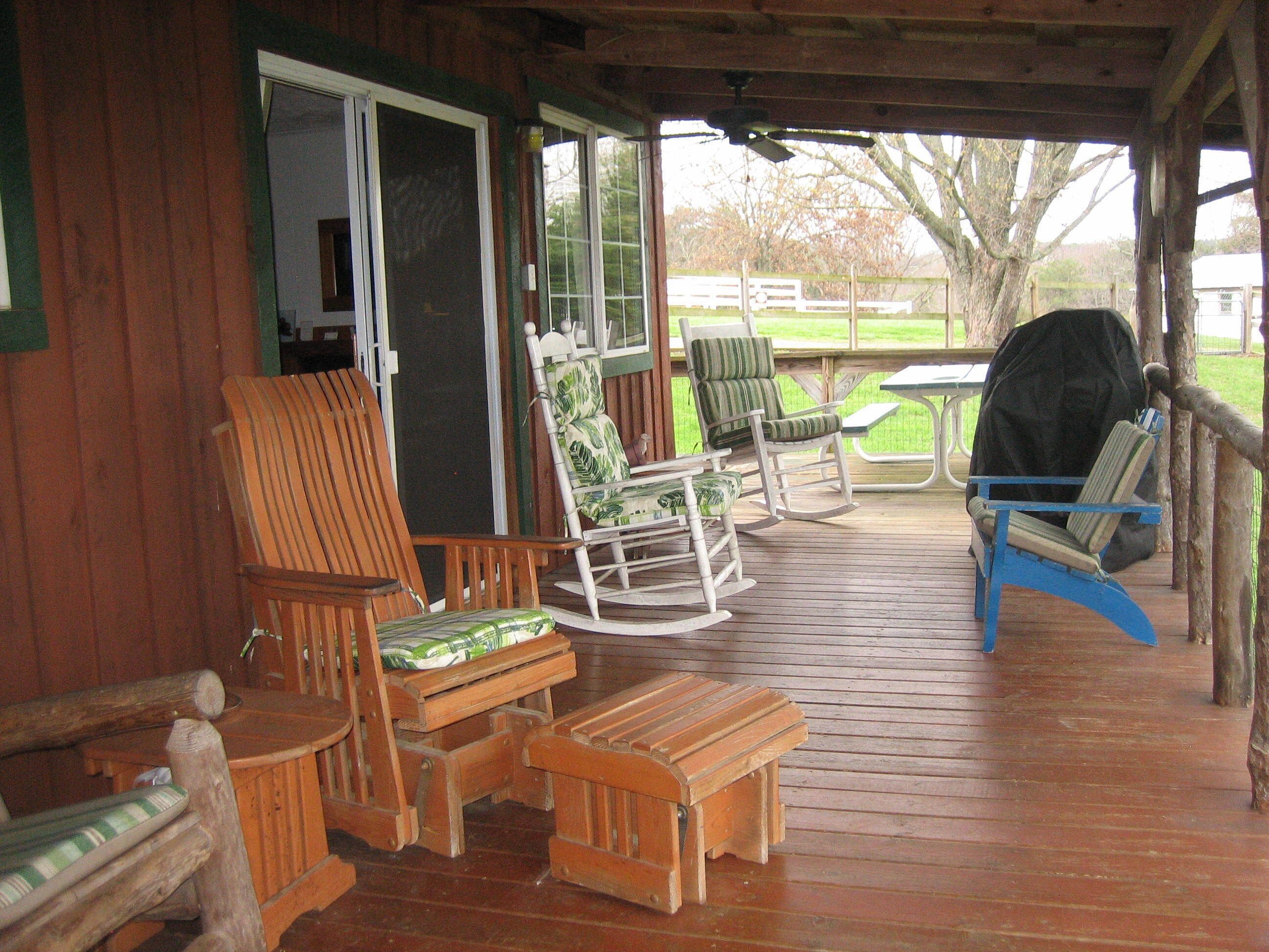 More sitting areas on the deck...the Living Room is through the sliding door.