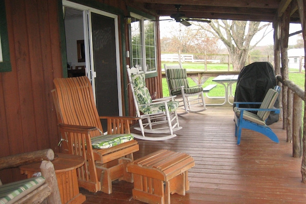More sitting areas on the deck...the Living Room is through the sliding door.