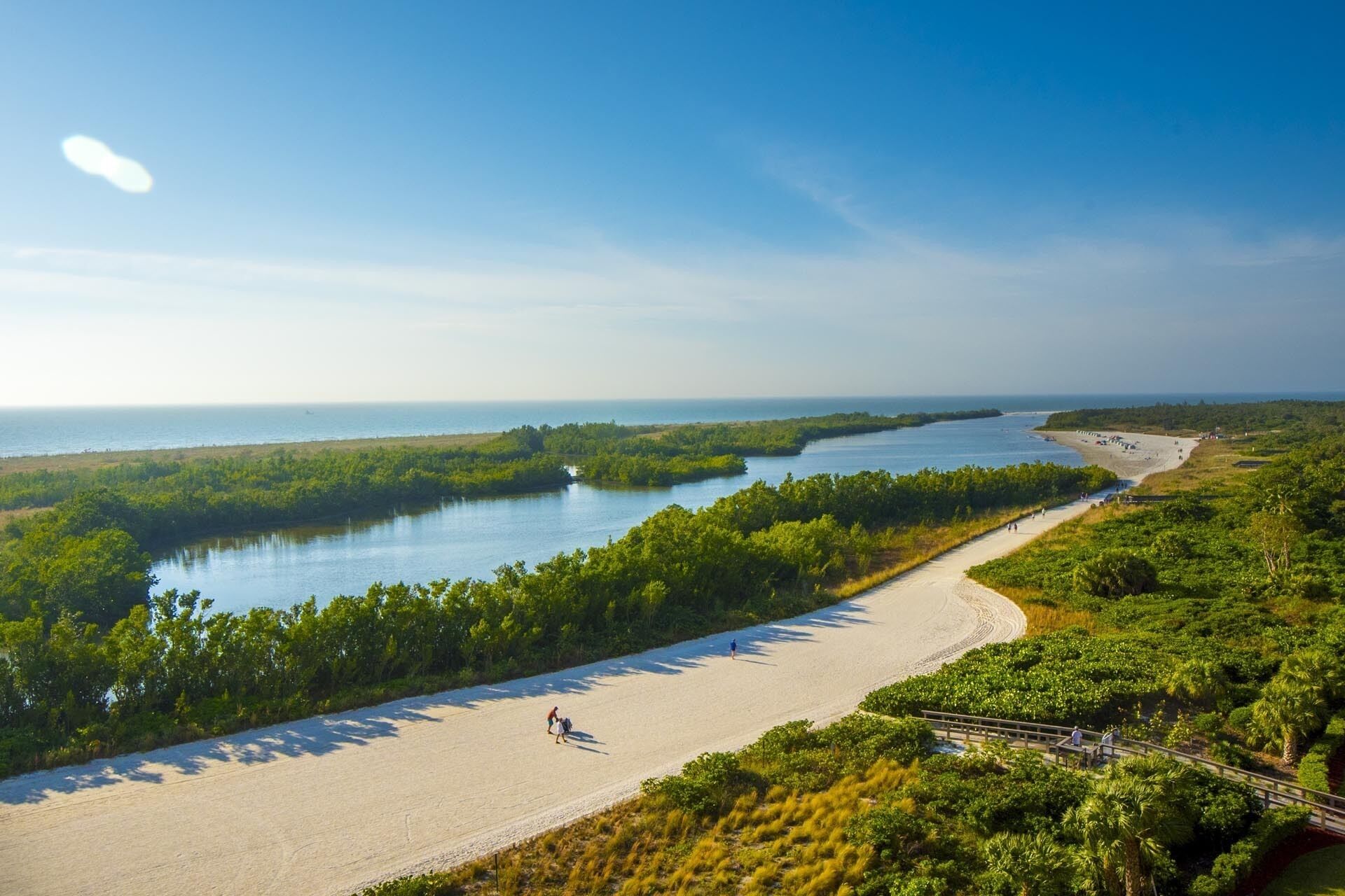 On the beach, sun loungers, beach towels