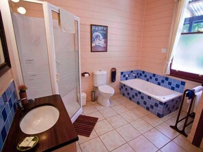 Bathtub, jetted tub, hair dryer, towels