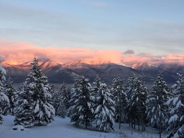 Incredible winter alpenglow on the mountains surrounding Bigfork Montana