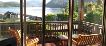 We sleep 10 (8 adults) Lakefront condo; staggering lake/mountain view; in town.