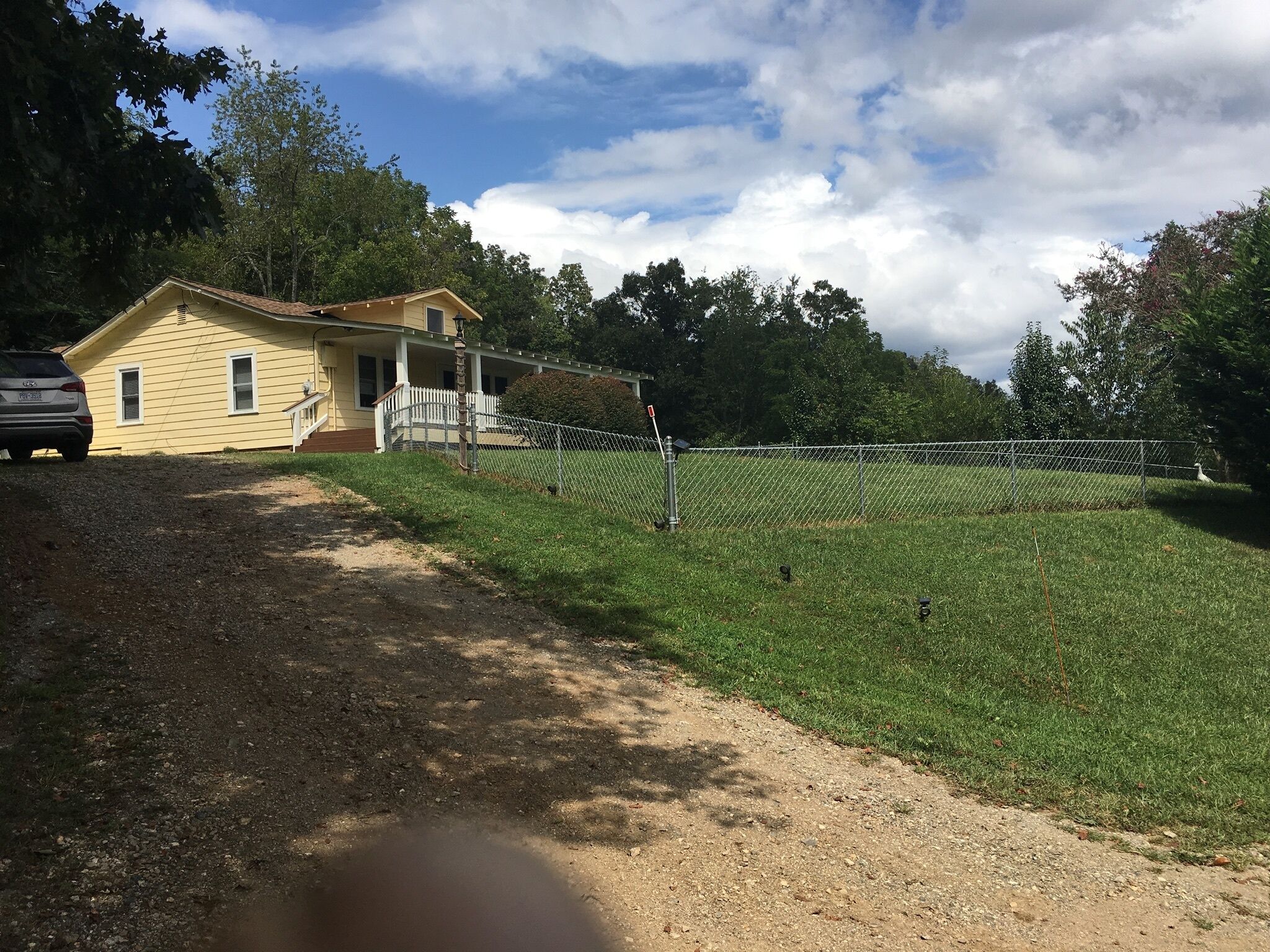 Cozy country home with great views and big porch. Family friendly great kitchen.