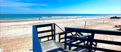 On the beach, sun loungers
