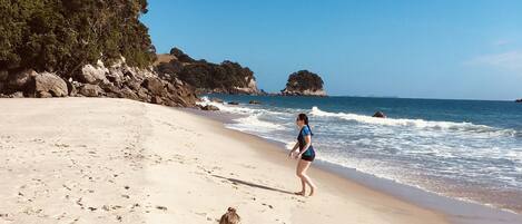 On the beach, sun loungers