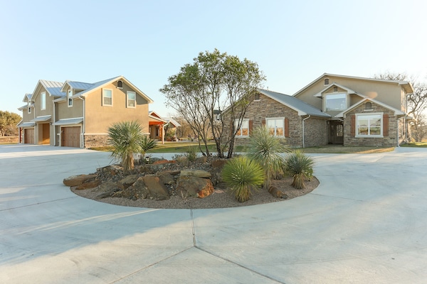 Entry Drive with tons of parking space. RV hookup is on concrete drive also.