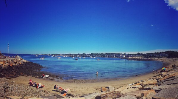 On the beach, sun loungers, beach towels