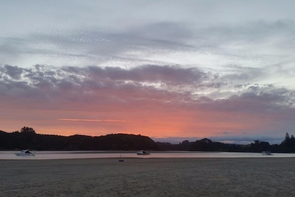 On the beach, sun loungers, beach towels
