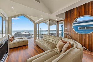 65-inch Smart TV with digital channels, fireplace